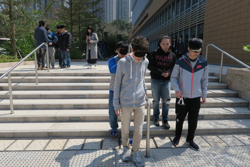 Students in blindfold went for a walk on campus