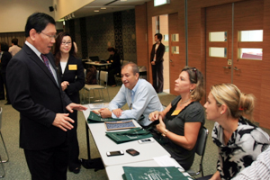 Prof Gilbert Fong (left) chatted with representatives before the meeting