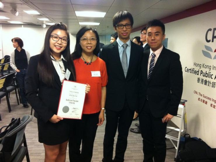 From left to right: LUK Hiu Ying Crystal (graduate, 2014), Ms Betty Kwok,  KAN Tsz Wa (BBA-4) and LO Kwok Tung (BBA-4)  took a group photo in the award ceremony for scholarship recipients on 20 September 2014