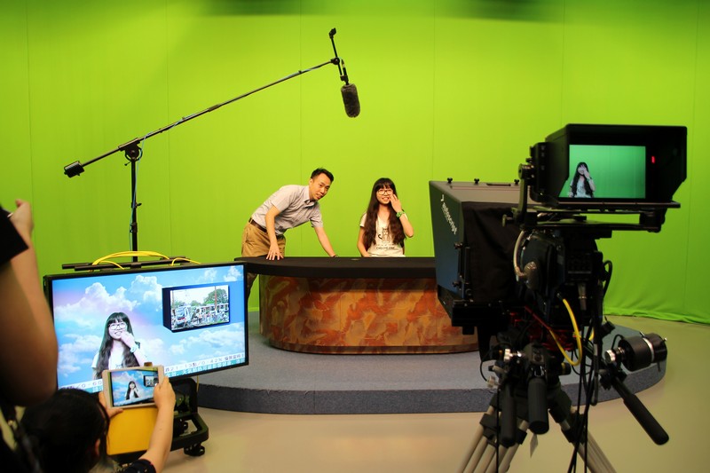 Students from Sichuan University was learning how to be a broadcast journalist