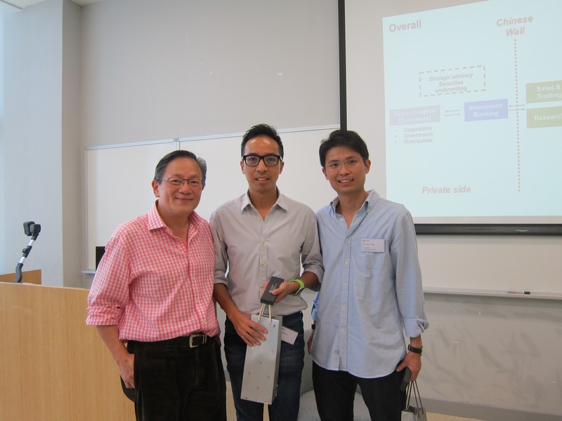 Dr David Chui (left) presenting a token of appreciation to Mr Samuel Lee (middle) and Mr Sunny Tam (right)
