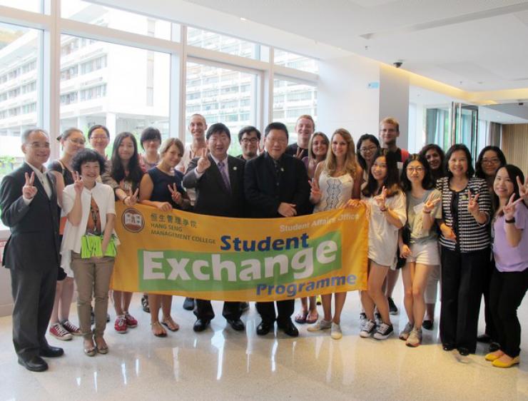 Front Row: Prof Simon Ho, President (fifth from left), Prof Gilbert Fong, Provost (sixth from left), Dr Karen Chan, Vice-President (Organisational Development) (second from right), Prof Raymond So, Dean of School of Business and Chairperson, Student Exchange Committee (far left) and staff from Student Affairs Office welcomed the exchange students