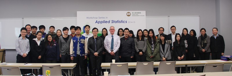 A group photo of the participants and the speakers