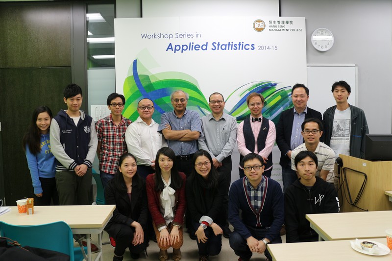 A group photo of the participants and the speakers