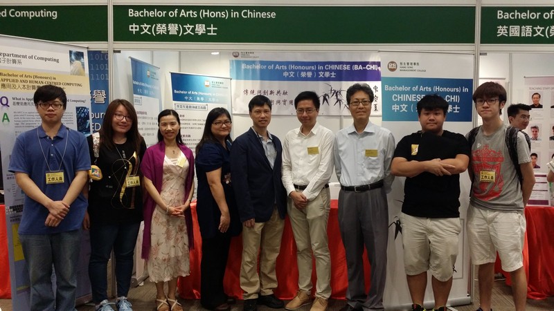 Teaching staff and students of the Department of Chinese in front of the information booth