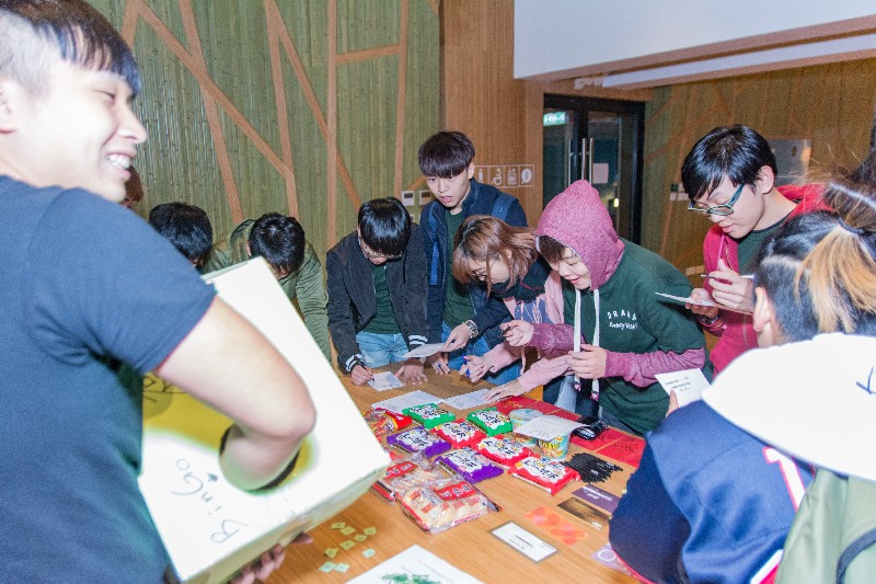 Students were playing games at Evergreen College’s booth