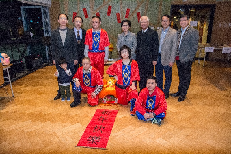 Group photo of invited guests with lion dance performers from Yiu On Integrated Rehabilitation Services Centre