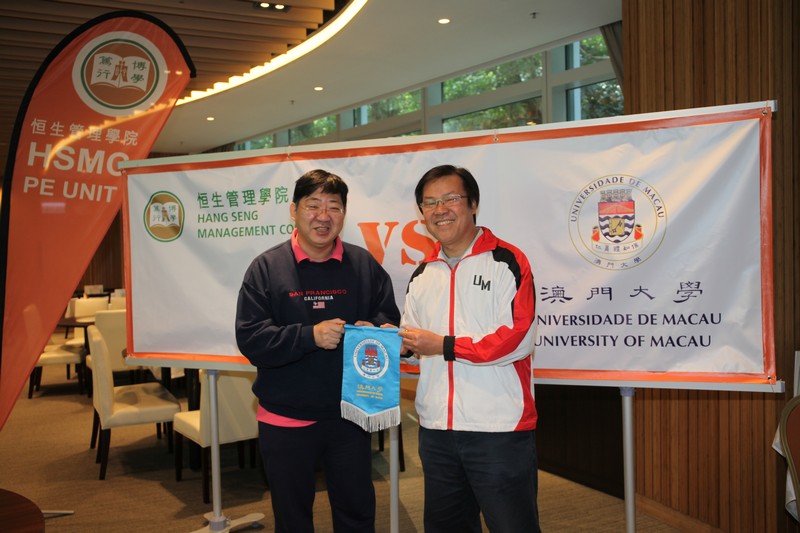 Dr Patrick Chan Ping Cheung, Director of the Office of Sports Affairs, University of Macau, presented a souvenir to HSMC President, Professor Simon S M Ho