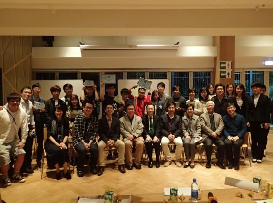 Group photo of the debaters and the adjudicators.