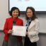 Prof Chow presented a certificate of appreciation to Ms Choy