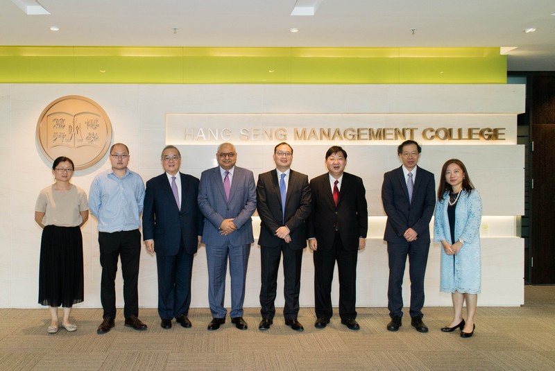 Dr Moses Cheng (3rd from left), Mr Rath Bhabani Sankar (4th from left), Mr Patrick Chan (4th from right), President Simon Ho (3rd from right), Vice-President Y V Hui (2nd from right) and representatives from Executive Development Centre and Department of Mathematics and Statistics