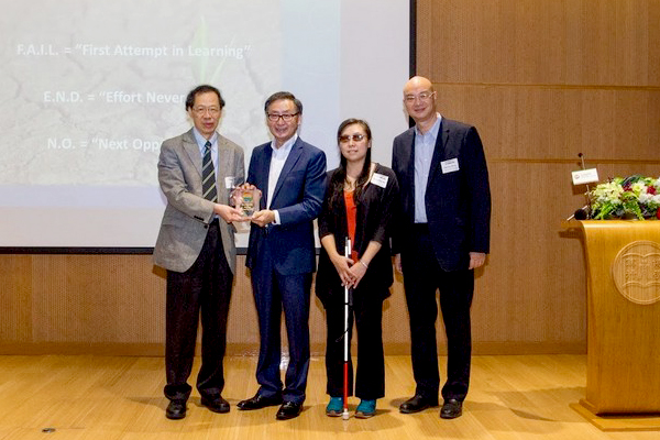 Vice-President Y V Hui (Academic and Research) (left) presented a souvenir to Mr Sunny Wong (2nd from left)