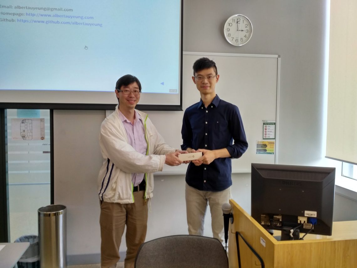 Dr Chan Chi Kong of Department of Computing presented a souvenir to Dr Au Yeung.