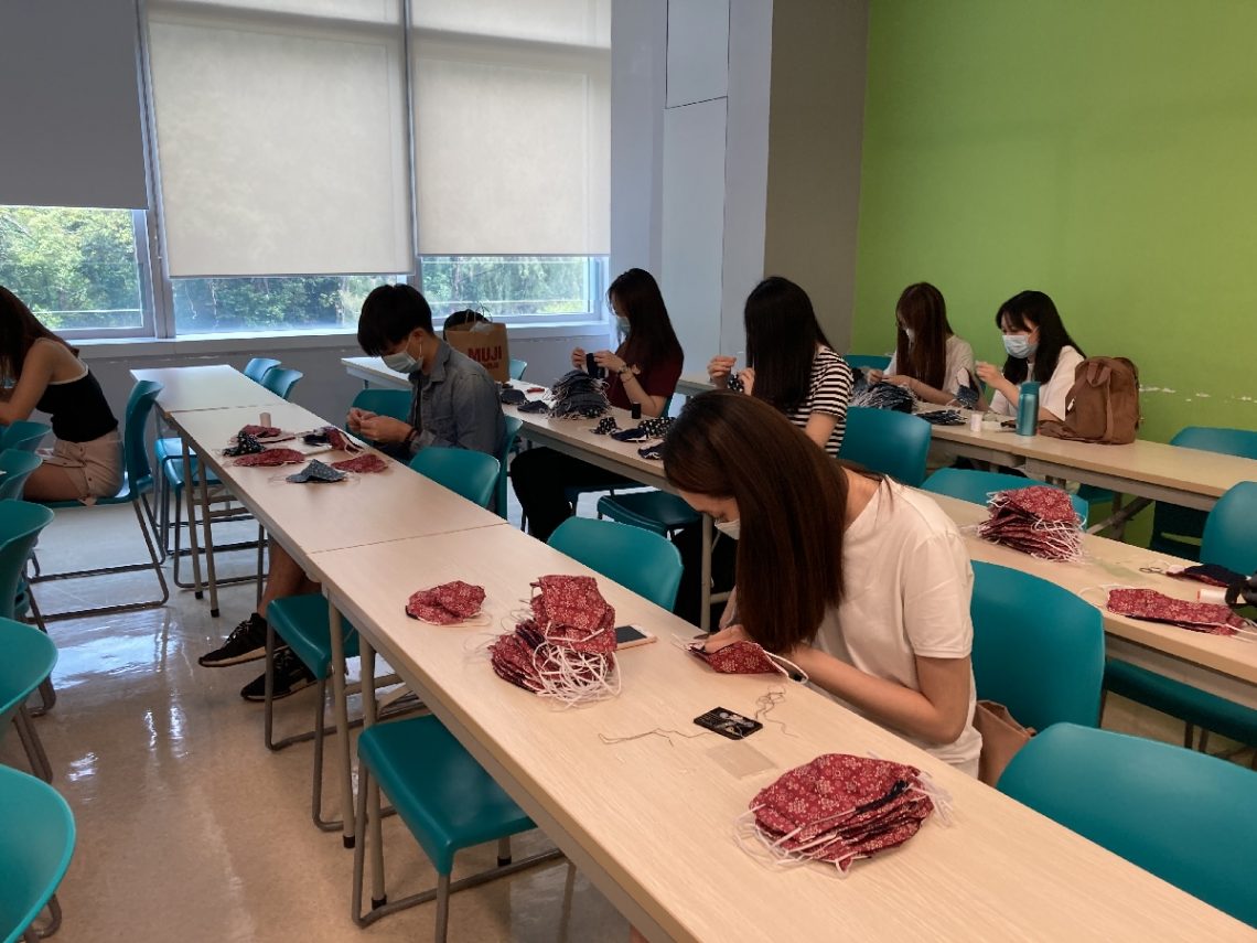 Students are conducting the quality control practices for the hand-made face masks.