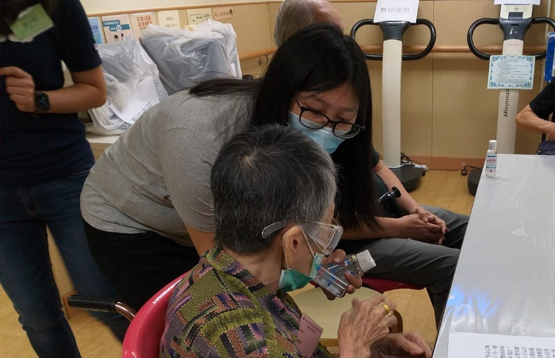 Hand sanitisers are distributed in the elderly centre.