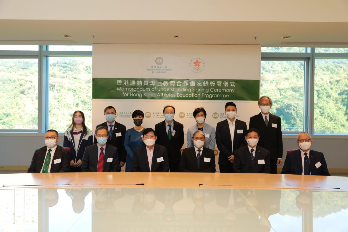 Group photo of the guests attending the signing ceremony.