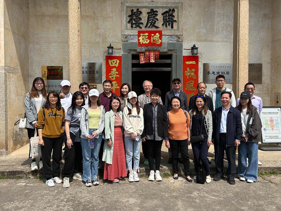 The group is warmly welcomed by local officials in Wuhua County, at the former residence of football champion, Li Huitang.