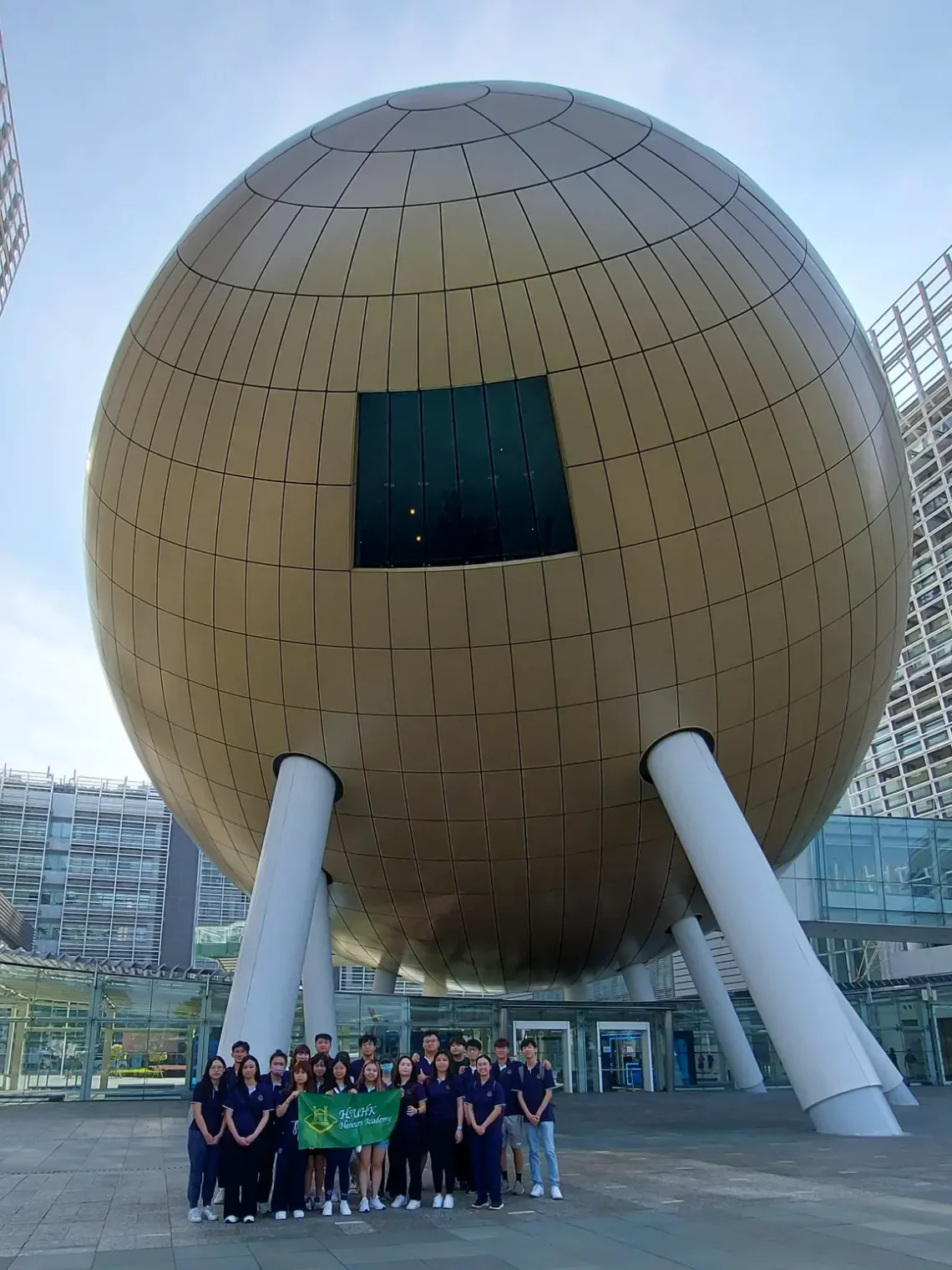 HA students outside the well-known Golden Egg, Charles K. Kao Auditorium, HKSTP.