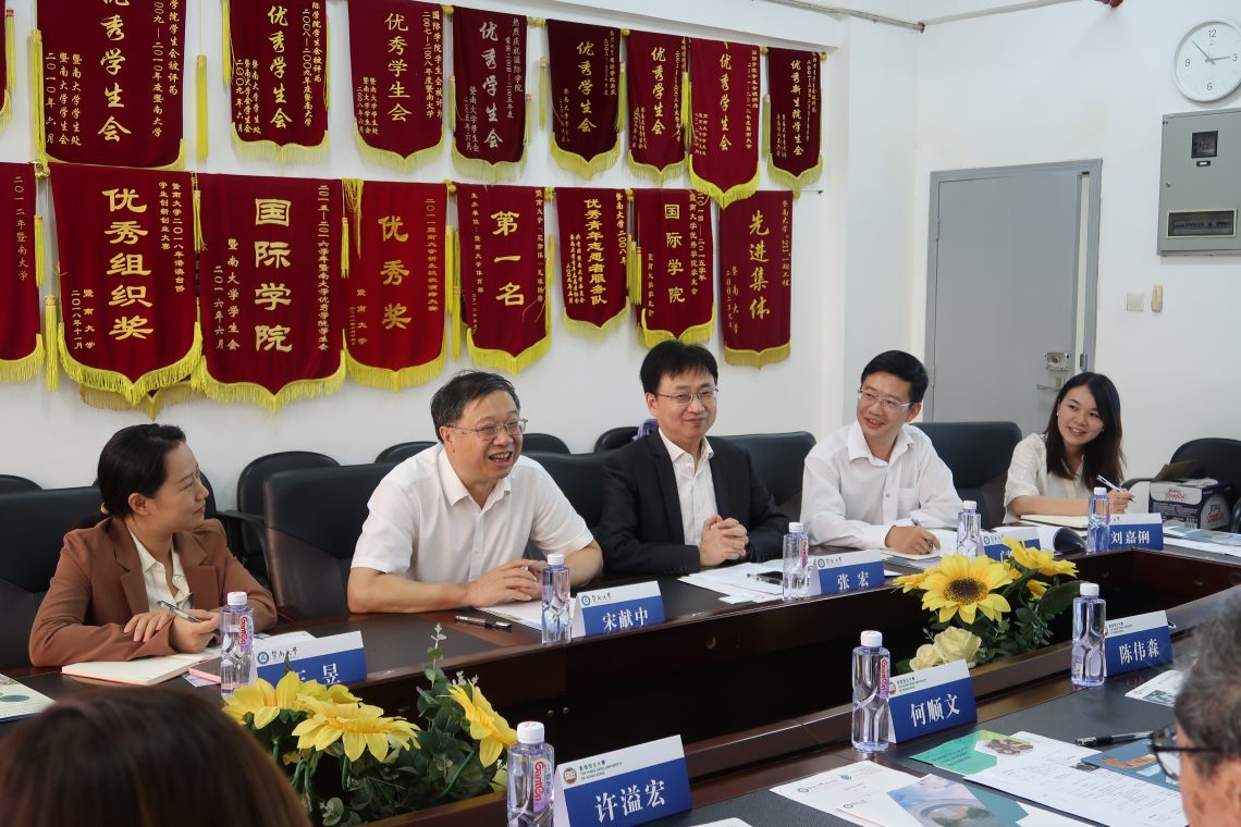 HSUHK delegation is welcomed by Professor Song Xianzhong, President of JNU, alongside other representatives